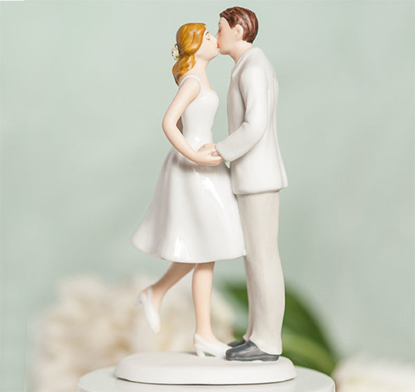 Leg Pop Kissing Bride &amp; Groom Cake Topper